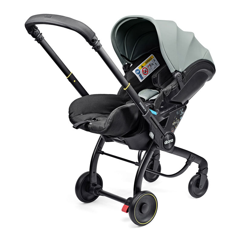 Doona Babyskydd "X" med vagn Dusty Sage