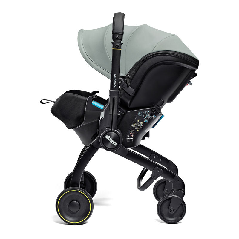 Doona Babyskydd "X" med vagn Dusty Sage