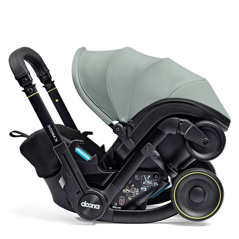 Doona Babyskydd "X" med vagn Dusty Sage