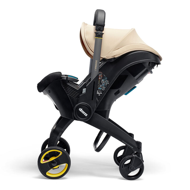Doona Babyskydd "i" med vagn Sahara Sand