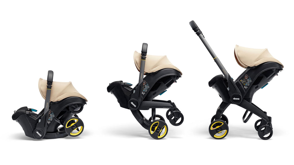 Doona Babyskyld "i" med vogn Sahara Sand